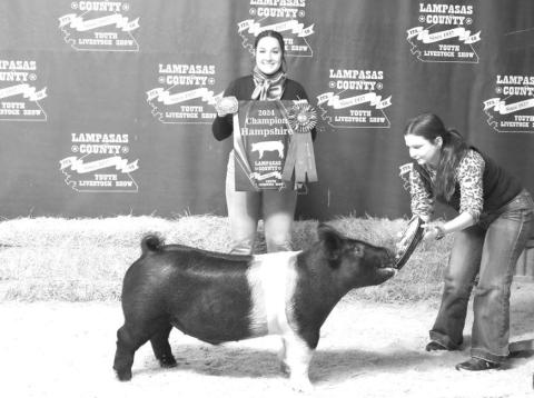 MASON HINES | DISPATCH RECORD Avery Hopson’s Hampshire entry was the grand champion market hog at this year’s county youth livestock show.