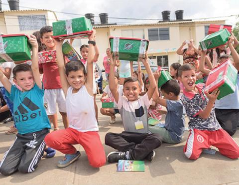 Operation Christmas Child prepares shoebox gifts for children such as these in countries around the world. COURTESY PHOTO | SAMARITAN’S PURSE