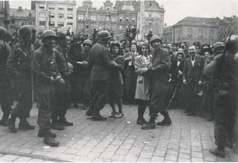 PHOTO FROM COMBAT HISTORY OF THE SECOND INFANTRY DIVISION IN WORLD WAR II May 8 marked the 80th anniversary of Victory in Europe Day. This photo shows a celebration in Pilsen, Czechoslovakia, where U.S. troops were greeted by cheering throngs of local residents after Nazi Germany’s surrender in 1945.