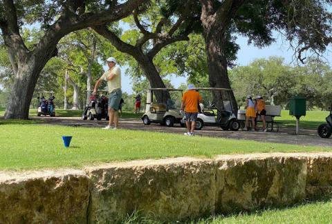 Golfers wait to tee off during last weekend’s Britches and Bows tournament at Hancock Park Golf Course. COURTESY PHOTO