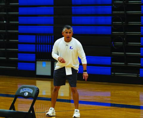 HUNTER KING | DISPATCH RECORD Marcus Chapa coaches his team at practice early in the 2024-2025 season.