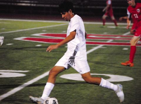 Jose Gomez prepares to play