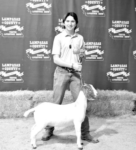 Jonathan Harris garnered the Buddy Perry Award this year. He is pictured with his breeding goat entry. ERICK MITCHELL | DISPATCH RECORD