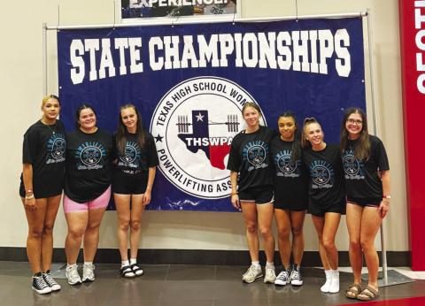 Lady Badger lifters pose for a photo at the state powerlifting meet last weekend. COURTESY PHOTO