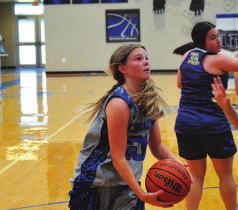 Addison Borchardt goes to the basket for a layup. HUNTER KING | DISPATCH RECORD