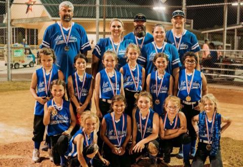 The 8U coach pitch team Lil’ Pitches placed third and went 3-2 in a district tournament in Temple. Pictured are, bottom row left to right, Jordi Andrews, Aaryn Friedlander, Sadie Walker, Holley Ann Wakeman, Brooklyn Brewer and Cora Eckermann; middle row, Kadi-Ann Harris, Evalynn Seward, Blake Andrews, Brynn Crawford, Riley Banks and Amsi Suarez; back row, coaches Derrek Eckermann, Misty Wakeman (head coach), Jeff Crawford, Jennifer Harris and Justin Andrews. COURTESY PHOTO