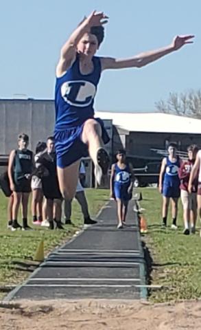Calum Mitchell earned gold in triple jump and discus. COURTESY PHOTO