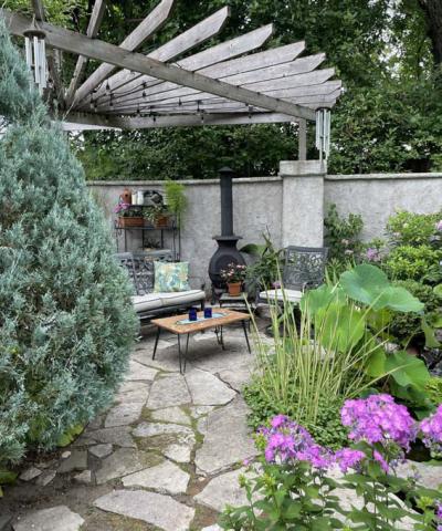 This patio is transformed into an outdoor oasis and entertainment area. COURTESY PHOTO | MELINDAMYERS.COM