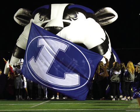 One Badger tradition is parading the Lampasas flag before players run out onto the field. FILE PHOTO