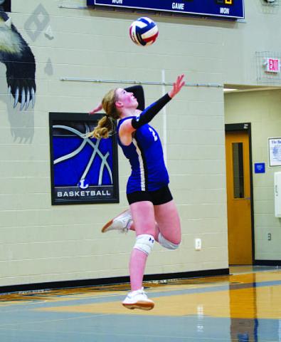 Ellie Felkner jumps to serve against Salado last Friday. HUNTER KING | DISPATCH RECORD