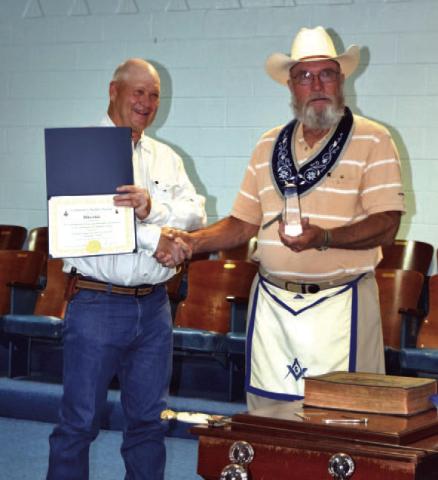 Mike Hail, at left, was presented the Community Builder Award by Saratoga Masonic Lodge. He is shown with Lodge Master Tommy Thogmartin. COURTESY PHOTO