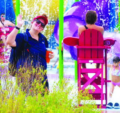 COURTESY PHOTO At left, Bailey Carter gives a wave to the camera during her time with Killeen’s Parks and Recreation Department. Now, Carter is looking to improve the Lampasas parks scene in her new role as recreation specialist for the city.