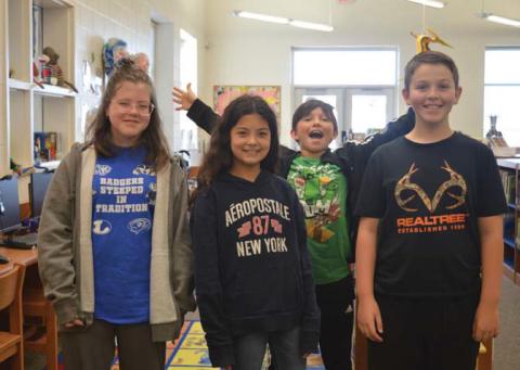 Taylor Creek Elementary School students, left to right: Raegan Brown, Gabriella Correa, Matthew Ruehlen and Gentry Barber. erick mitchell | dispatch record