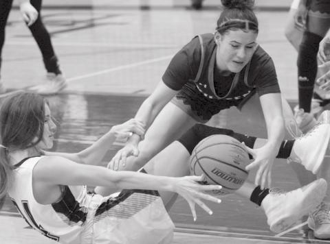 LHS senior Addison McDonald fights for a loose ball in Tuesday’s 49-46 victory over Killeen High School. JEFF LOWE | DISPATCH RECORD