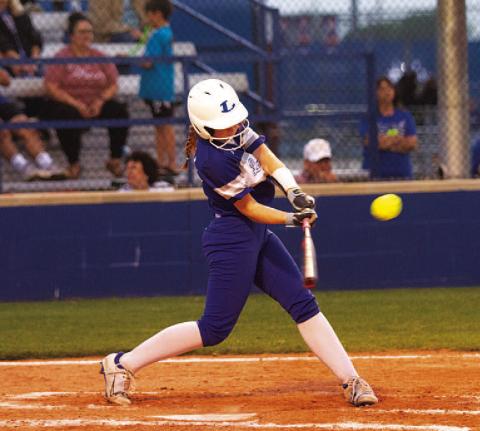 HUNTER KING | DISPATCH RECORD Jenni Posten hits a line drive during game two of the playoff series.
