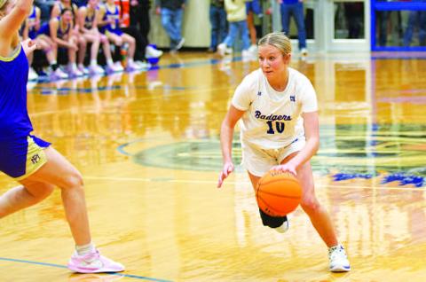 HUNTER KING | DISPATCH RECORD Tenley Langford dribbles past a defender in the fourth quarter of last Friday’s game.