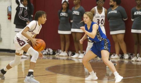 Hadley Oncken guards the Lady Roo ball handler in the second half of Tuesday’s game. HUNTER KING | DISPATCH RECORD