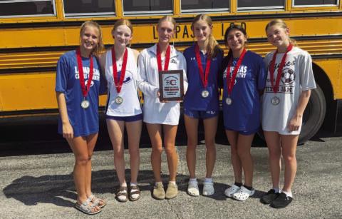 COURTESY PHOTO | KIM BURNSIDE From left, Makenzie Shaughnessy, Kenzie Stone, Leah Phillips, Adyson Martin, Monica Munoz and Brylie Centunzi-Sanchez pose with their medals and plaque from the Lake Belton Invitational.