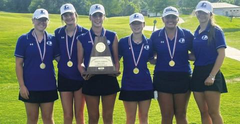 The Lady Badger golf team shows off their trophy and medals from winning the regional golf tournament last week. COURTESY PHOTO | LAMPASAS HIGH SCHOOL FACEBOOK