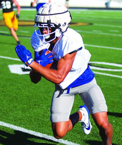 HUNTER KING | DISPATCH RECORD Ty Johnson made multiple plays including scoring a touchdown in the scrimmage.