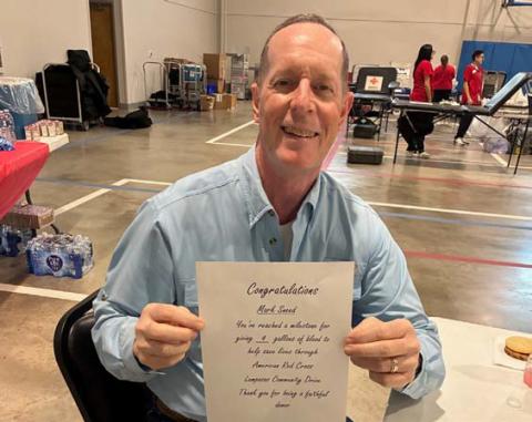 Mark Sneed has donated a total of four gallons of blood. court esy photo