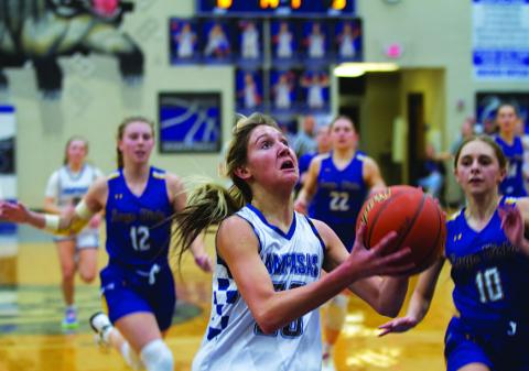 Girls’ basketball team battles for win over Lago Vista
