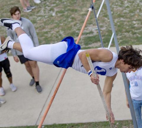 Ethan Moreno earned a bronze, a silver and a gold medal in separate field events at Thursday’s meet. In pole vaulting, he placed third. JEFF LOWE | DISPATCH RECORD
