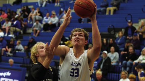 HUNTER KING | DISPATCH RECORD Beau Patterson fights through contact to finish at the rim against the Goldthwaite Eagles.