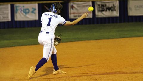 Gia Grasso turns to throw to second base in the Lady Badgers’ district opener on Tuesday. HUNTER KING | DISPATCH RECORD