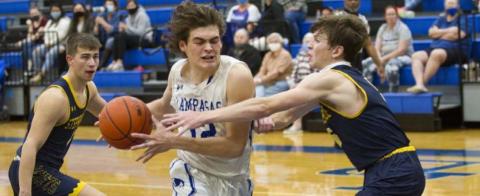 Landon Mulcahy drives to the basket in an earlier district game before the Badgers’ loss at Glen Rose. JEFF LOWE | DISPATCH RECORD