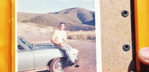 Elzie Jones shows a photo of his car a week after he bought it in the late 1960s. COURTESY PHOTO