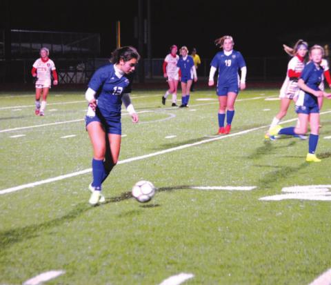 Tate Brown dribbles in the midfield and moves the ball up the field against the Salado Lady Eagles on Wednesday night. HUNTER KING | DISPATCH RECORD