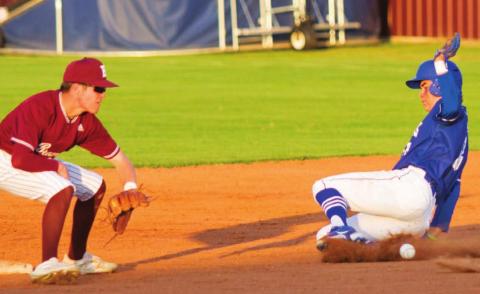 Tak Stinnett slides safely into second for a steal. Stinnett had three RBIs, and the Badgers cut a nine-run deficit down to three runs but lost Tuesday. JEFF LOWE | DISPATCH RECORD