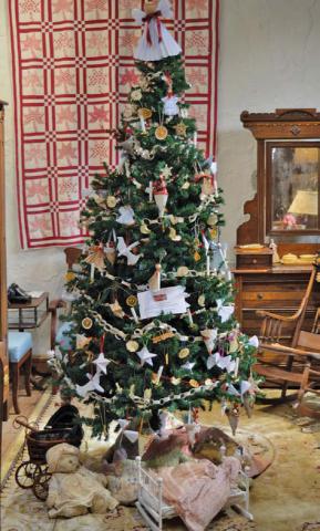 The museum was filled with the Christmas spirit during last weekend’s Carol of Lights celebration, as entries were displayed for the annual Tree Decorating Contest. erick mitchell | dispatch record