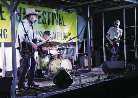 CHERI JAY-WIENECKE | DISPATCH RECORD Ray Wylie Hubbard, left, performs at the Sun Festival at Lometa Regional Park on Sunday. He is accompained by drummer Cal Schneider and guitarist Lucas Hubbard, pictured left to right. The festival featured live music and camping for the Monday eclipse.