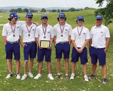 COURTESY PHOTO | GARRY SPORE James Clarkston, left, Coulson Plouff, Peyton Spore, Timber Gholson, Nick Haas and head coach Justin Schulze pose with their district championship plaque.