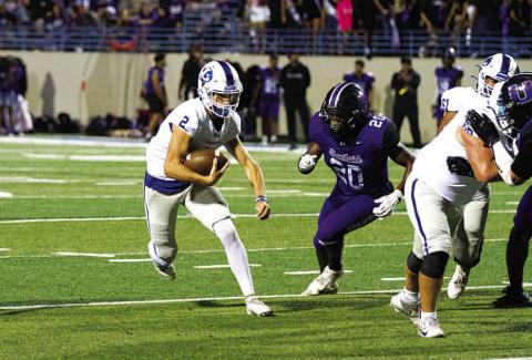 HUNTER KING | DISPATCH RECORD Bryson Roberts played the second half at quarterback and nearly led the Badgers to a win.