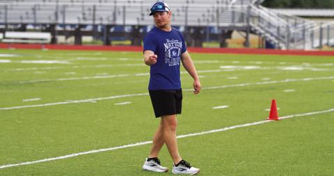 Case Brister leads a drill during SWAT on Tuesday morning at the high school. HUNTER KING | DISPATCH RECORD