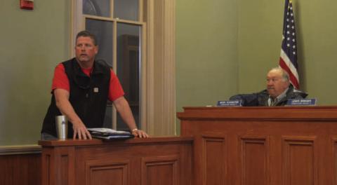 At left, John Stokes of All Seaons Service Inc. provides the Commissioners Court with an update regarding repairs to the HVAC systems in the county annex building at 407 S. Pecan St. ERICK MITCHELL | DISPATCH RECORD