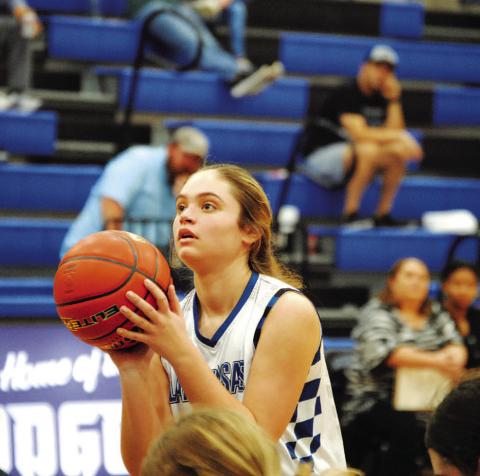 Morgan Bobo prepares to shoot a free throw during the win over Rouse. HUNTER KING | DISPATCH RECORD