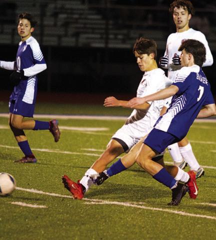 Cooper Pfaltzgraff makes a pass during Tuesday’s match against Harker Heights. HUNTER KING | DISPATCH RECORD