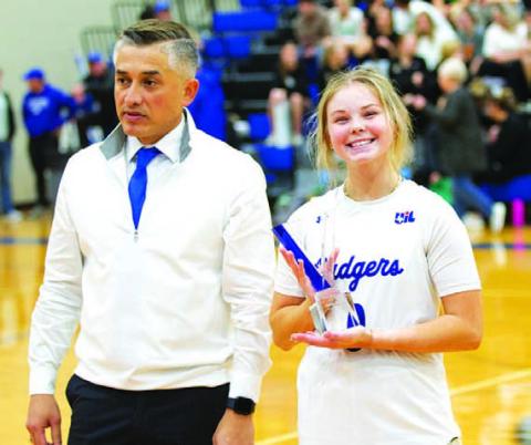 Addison Borchardt, with head coach Marcus Chapa, was named the Greater Texas Ford 4A Female Athlete of the Month. She received the award during halftime of the boys’ basketball game last Friday night. HUNTER KING | DISPATCH RECORD