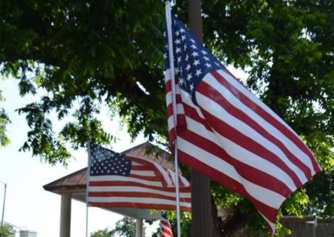 The Kiwanis Club will place an American flag outside each business sponsor for observances such as Veterans Day and Fourth of July. The fundraiser will benefit local youth. file photo