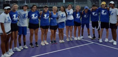 The Badger tennis team poses for a group photo after winning the first district match, which was in Stephenville on Friday. HUNTER KING | DISPATCH RECORD