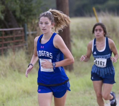 	Nyla Long runs down the trail during the Badgers