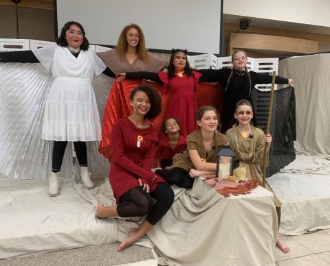 Providence Christian Academy theater instructor Juliana Dwamena, standing second from left, poses with cast members of “The Fire Within.” courtesy photo