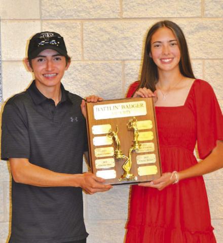COURTESY PHOTO | KENNETH PEISER Clayton Shaw, left, and Chesley Breuer pose with their Battlin’ Badger award.
