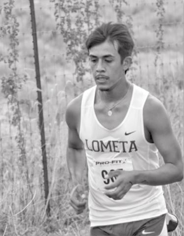 Enrique Prado competes in a meet earlier this season. JEFF LOWE | DISPATCH RECORD