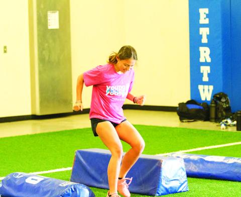 Chloe Thorp works through an agility drill Monday morning at SWAT. HUNTER KING | DISPATCH RECORD