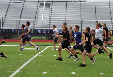 Middle school athletes are back at the high school this week for summer workouts. HUNTER KING | DISPATCH RECORD
